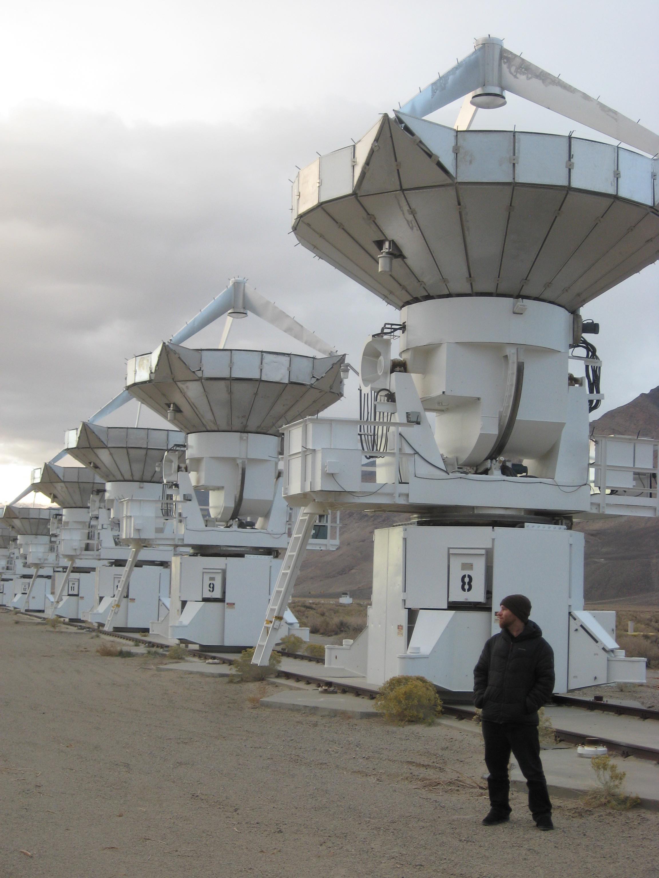 Jamie Leech next to telescope